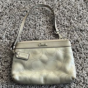 Coach wristlet never used- tan/ cream